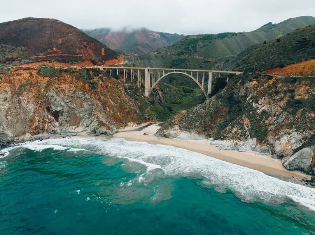 Photo by Luke Mitchell a bridge over a river