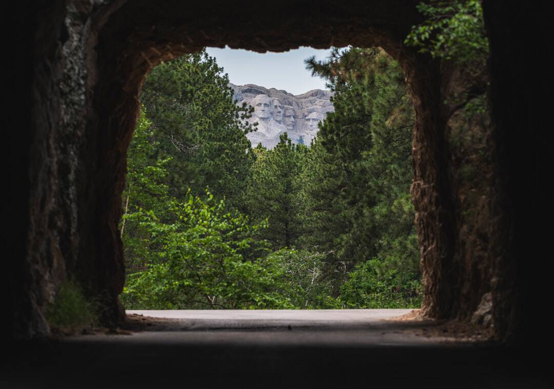 Photo by Jon Sailer A tunnel's view of mountains and trees.