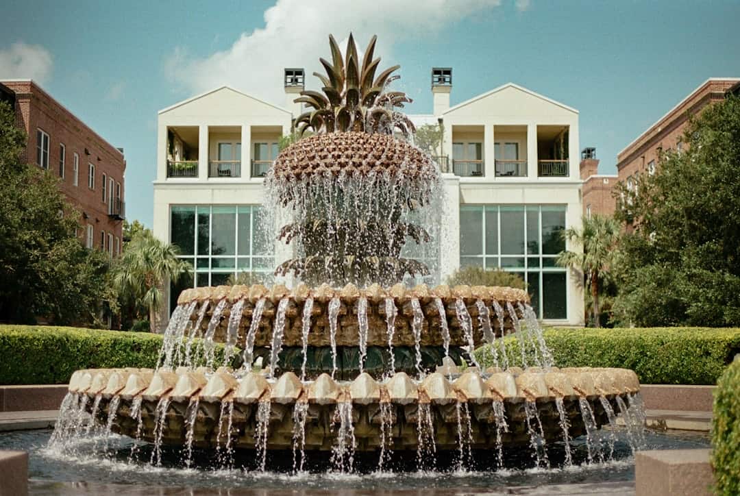 Photo by Emmy Gaddy water fountain in front of white building