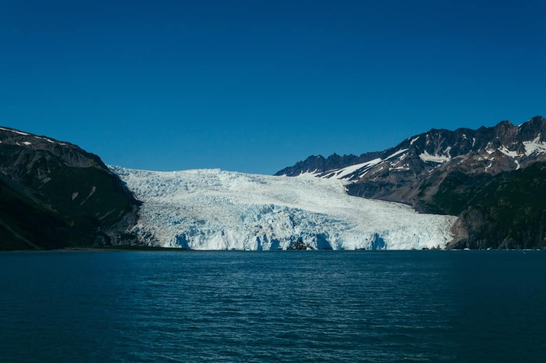 body of water and white mountain