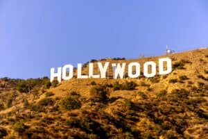 The hollywood sign is visible on a hill.
