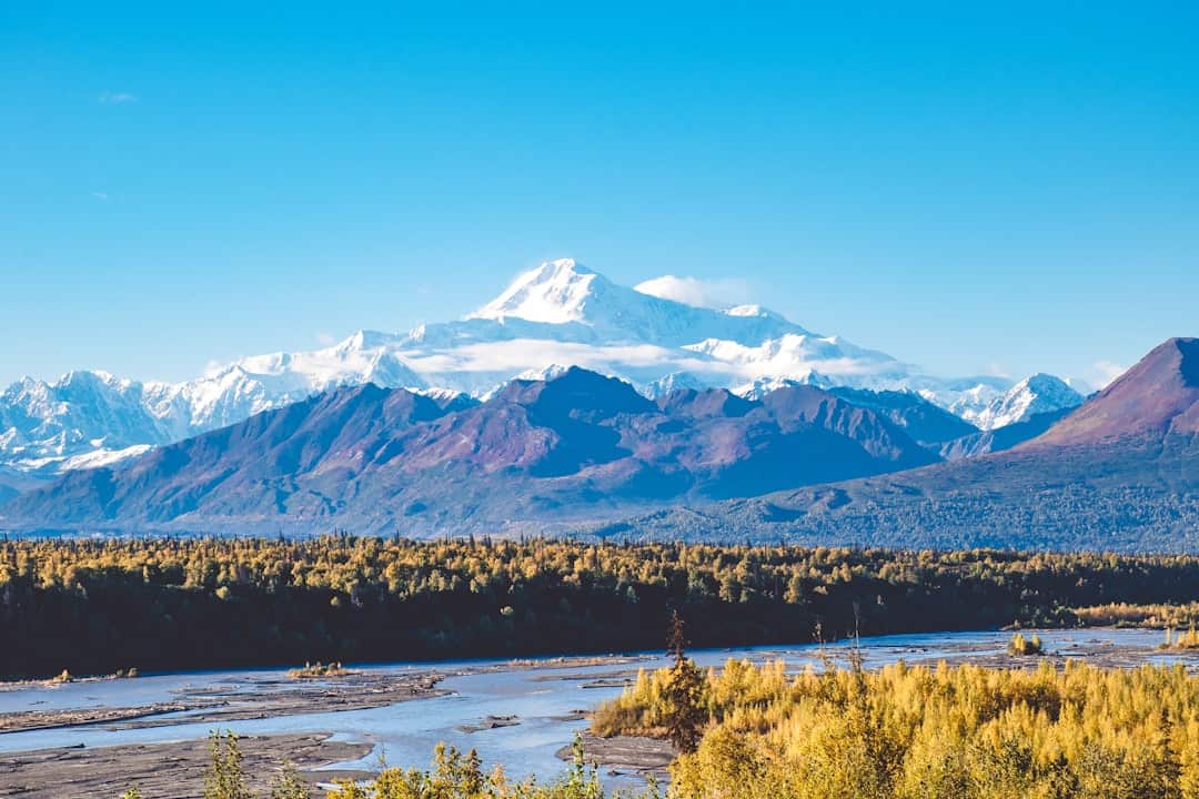 Photo by Jacob Vizek snow covered mountain during daytime