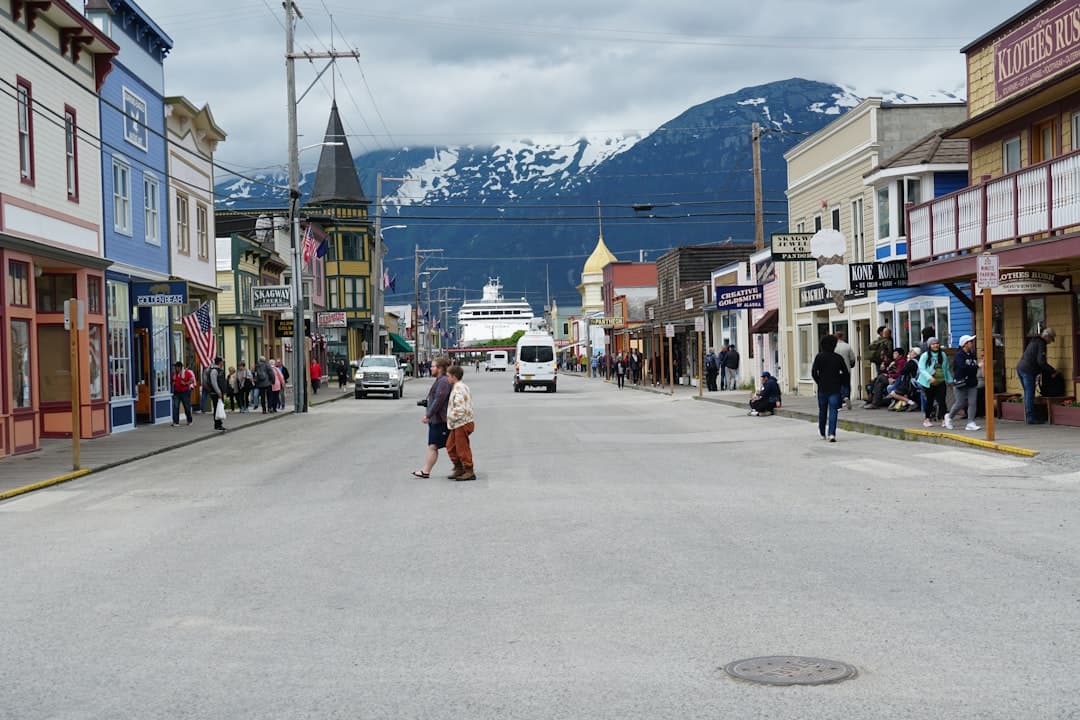 Photo by Sheila C A small town with a lot of people walking down the street