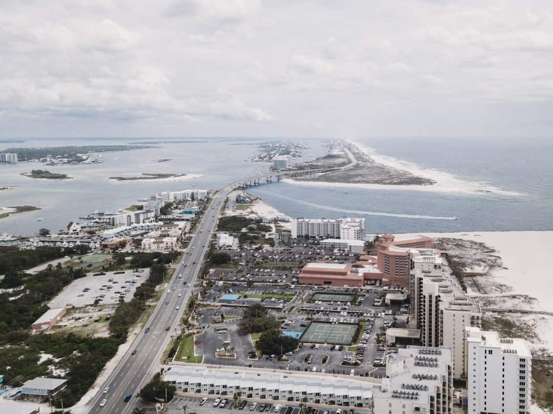 an aerial view of a city by the ocean
